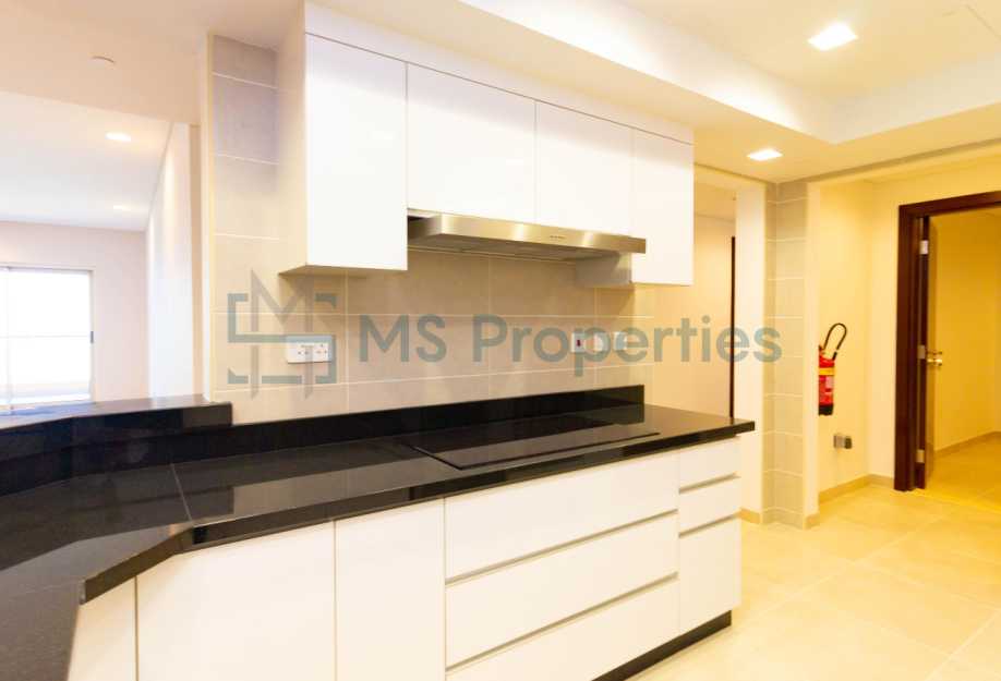 Modern Elegance 2BHK + Maid Room Flat with Balcony