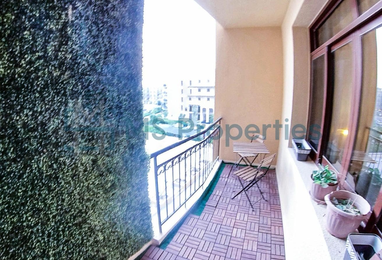 Cozy 1BR Apartment with Balcony | Prime Location