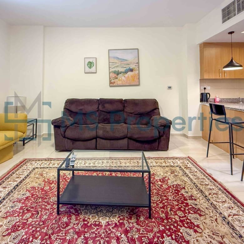 Cozy 1BR Apartment with Balcony | Prime Location
