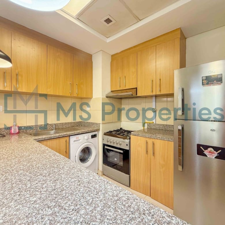 Cozy 1BR Apartment with Balcony | Prime Location