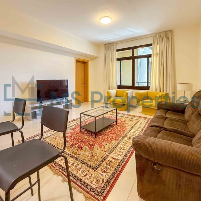 Cozy 1BR Apartment with Balcony | Prime Location