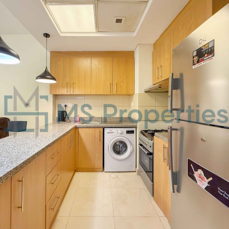Cozy 1BR Apartment with Balcony | Prime Location